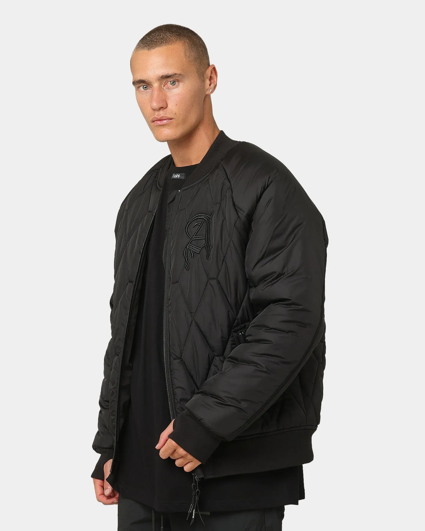 The Anti Order Corvus Quilted Bomber Jacket Black/White