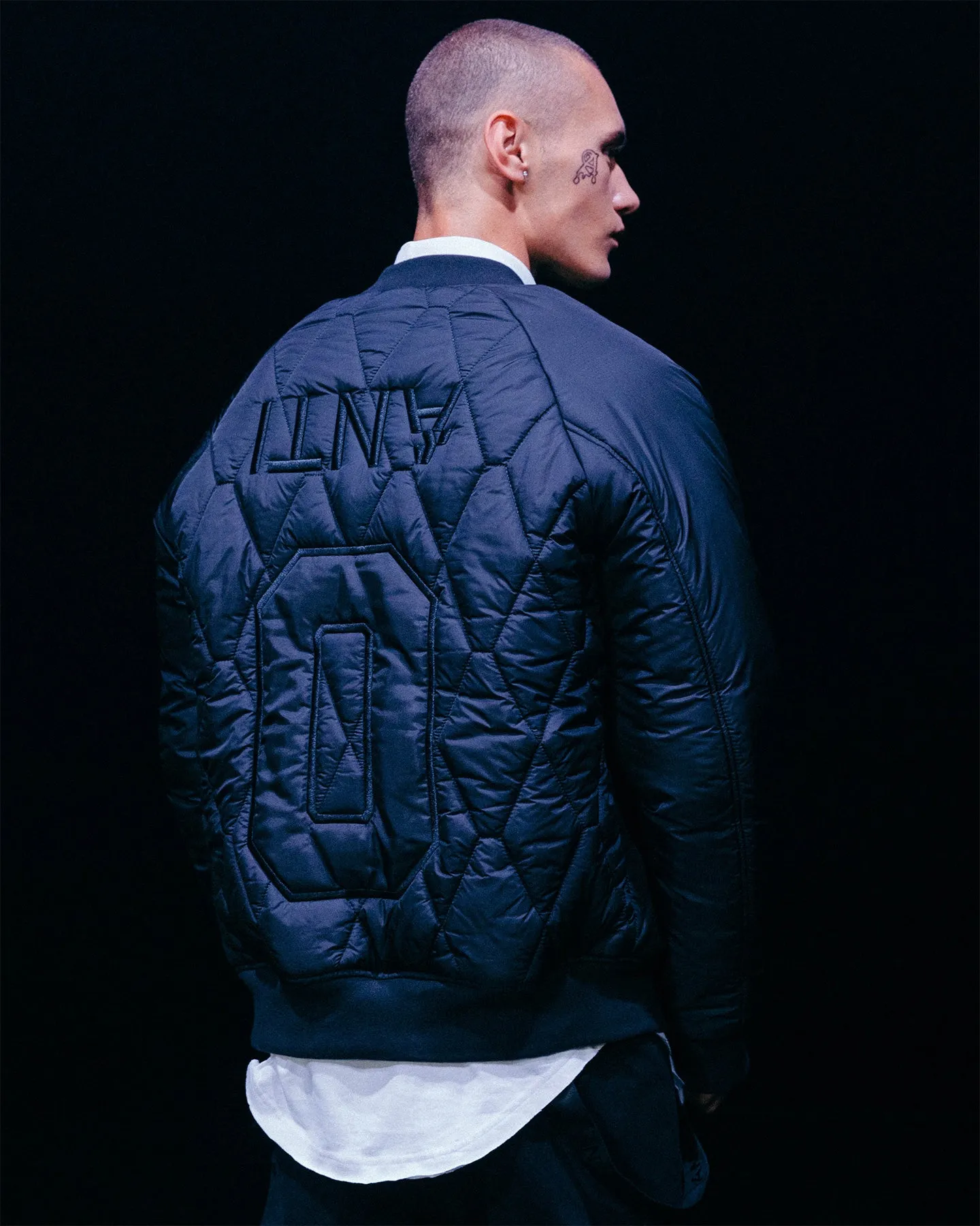 The Anti Order Corvus Quilted Bomber Jacket Black/White